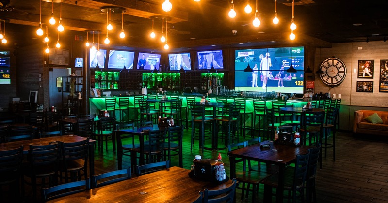 Bar area with few large TV screens