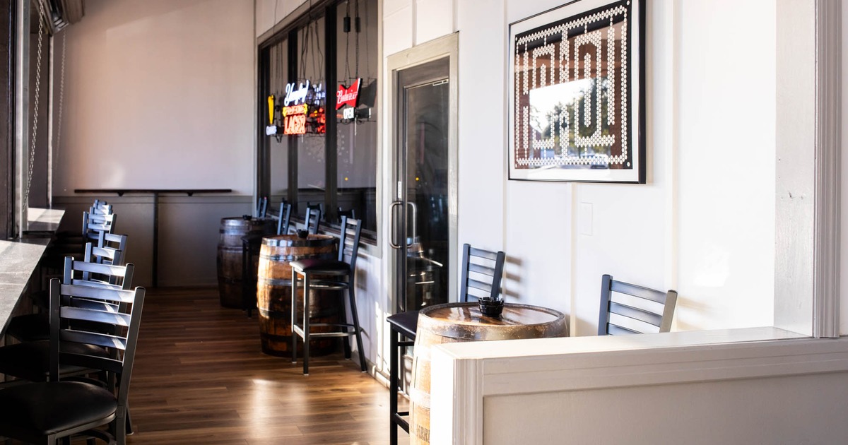 Interior, barrel tables with high bar stools