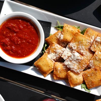 Toasted ravioli served with marinara sauce.