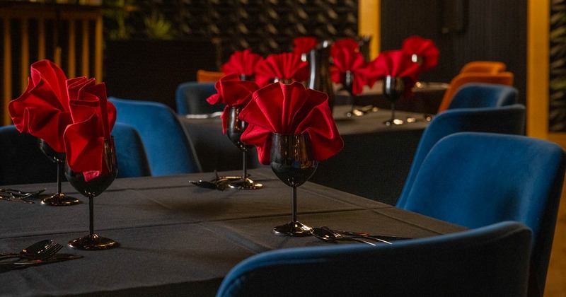 Interior, tables and chairs ready for guests