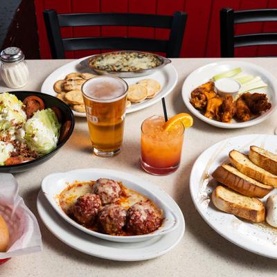 Food and drink assortment on a table.