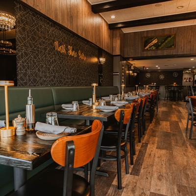 The interior space, set tables and chairs.