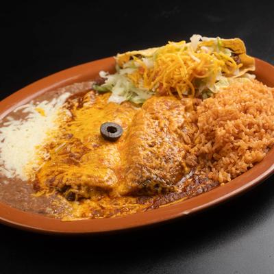 Enchiladas, served with refried beans and rice, and accompanied by a taco.