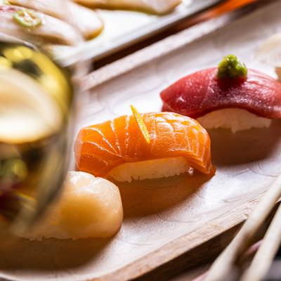 Close-up of salmon and tuna nigiri sushi.