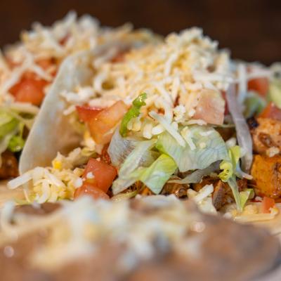 Portion of tacos, close-up.