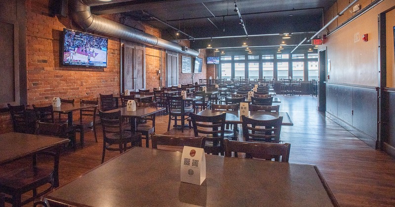 Interior, tables and chairs in seating area