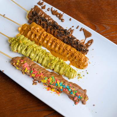 Waffle Sticks customized with various chocolates and toppings.