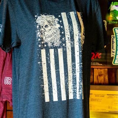 T-shirts and merchandize on display.