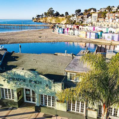 The wide shot of the restaurant and the bay.