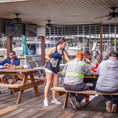 Employee tending to customers.