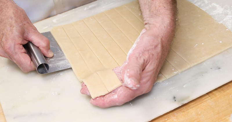 Rolling and cutting scratch made lattice