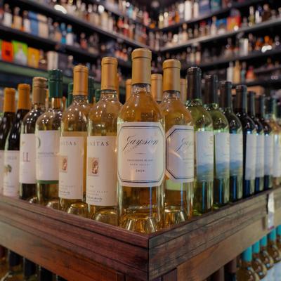 Assorted wine bottles.