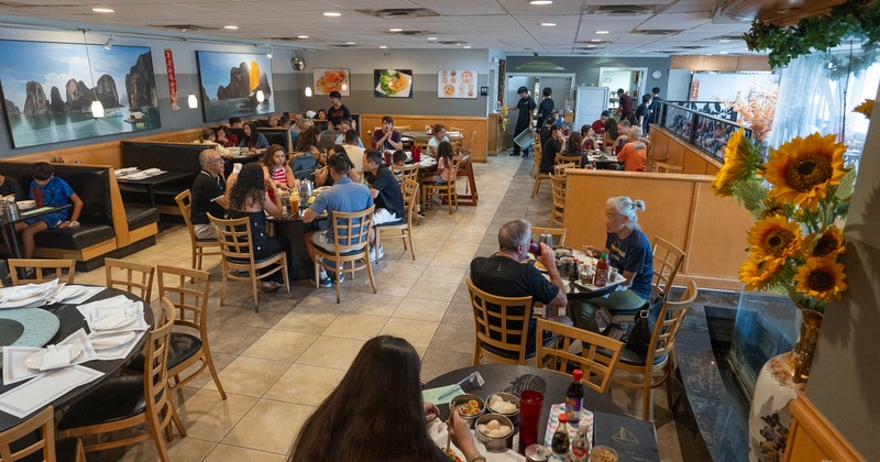 Diner area, tables,chairs, people