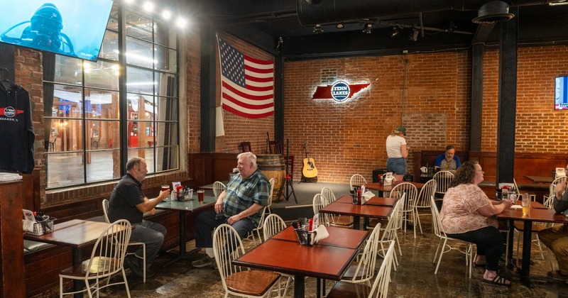 Interior, seating area with American flag on the wall