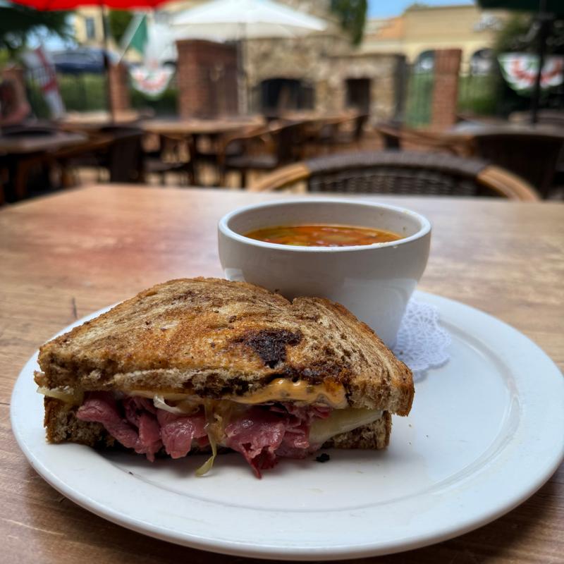 1/2 Rueben Sandwich w/ a cup of soup photo