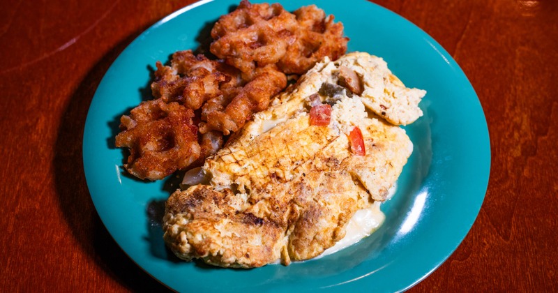 Omelette served with side dish