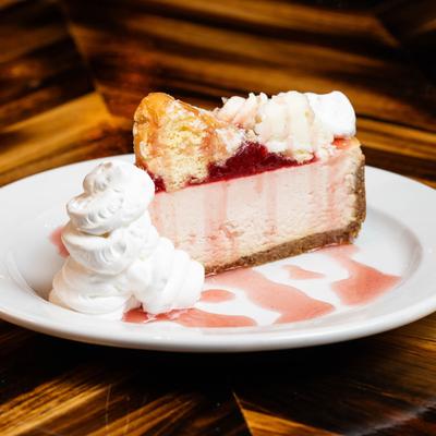 A slice of Raspberry Donut Cheesecake.