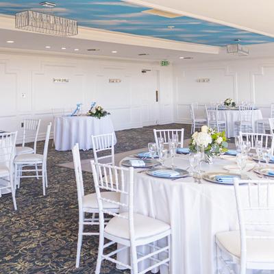 White tables and chairs.