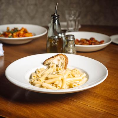 Ziti Alfredo with bread.