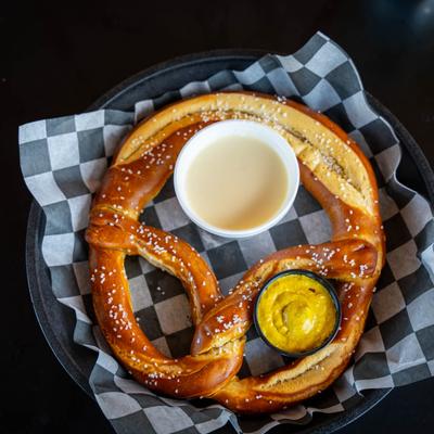 Giant Pub Pretzel, with cheese sauce and spicy brown mustard.
