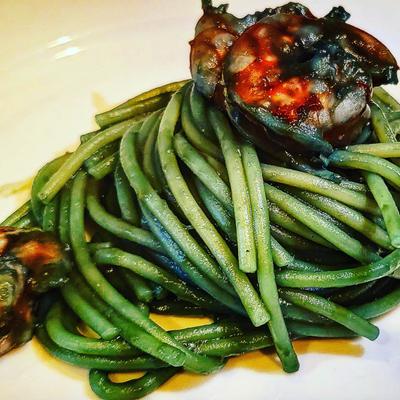 Rigatoni Basil Pesto with sauteed prawns.