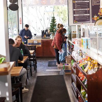 Restaurant interior, dining area with customers.