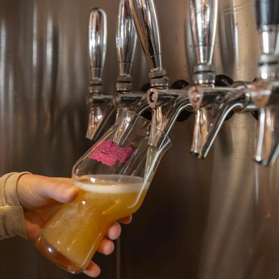 Draft beer being poured from the tap.