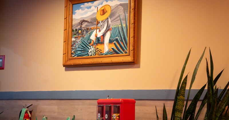 Table, chairs, paint on the wall