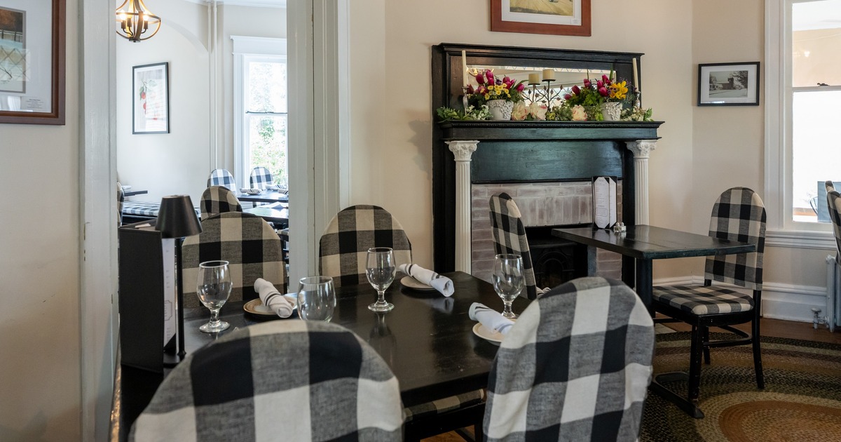 Interior, dining space with a fireplace