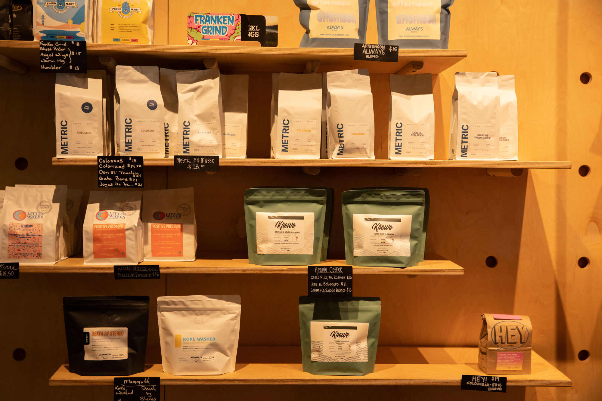 Shelves, paper bags with various ingredients and brand names