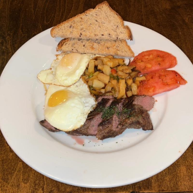 Steak and eggs photo