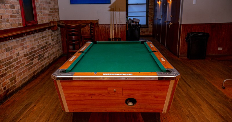 Pool room and pool table, cues and balls