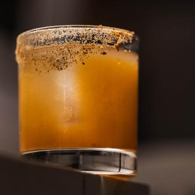 Honey Walnut Old Fashioned cocktail, closeup.