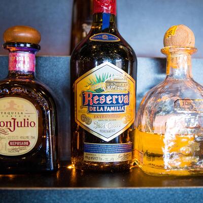 3 bottles of premium tequila, Don Julio Reposada, Tequila Reserva and Patron Reposada