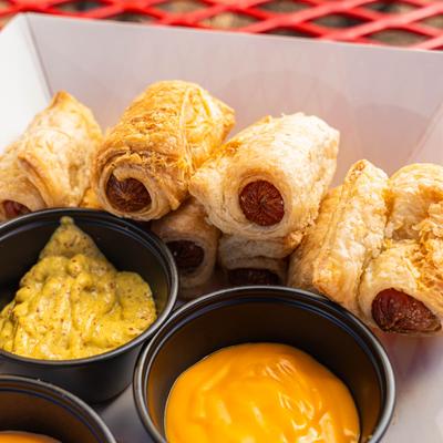 KKD’s Hog Tails served with dipping sauces.