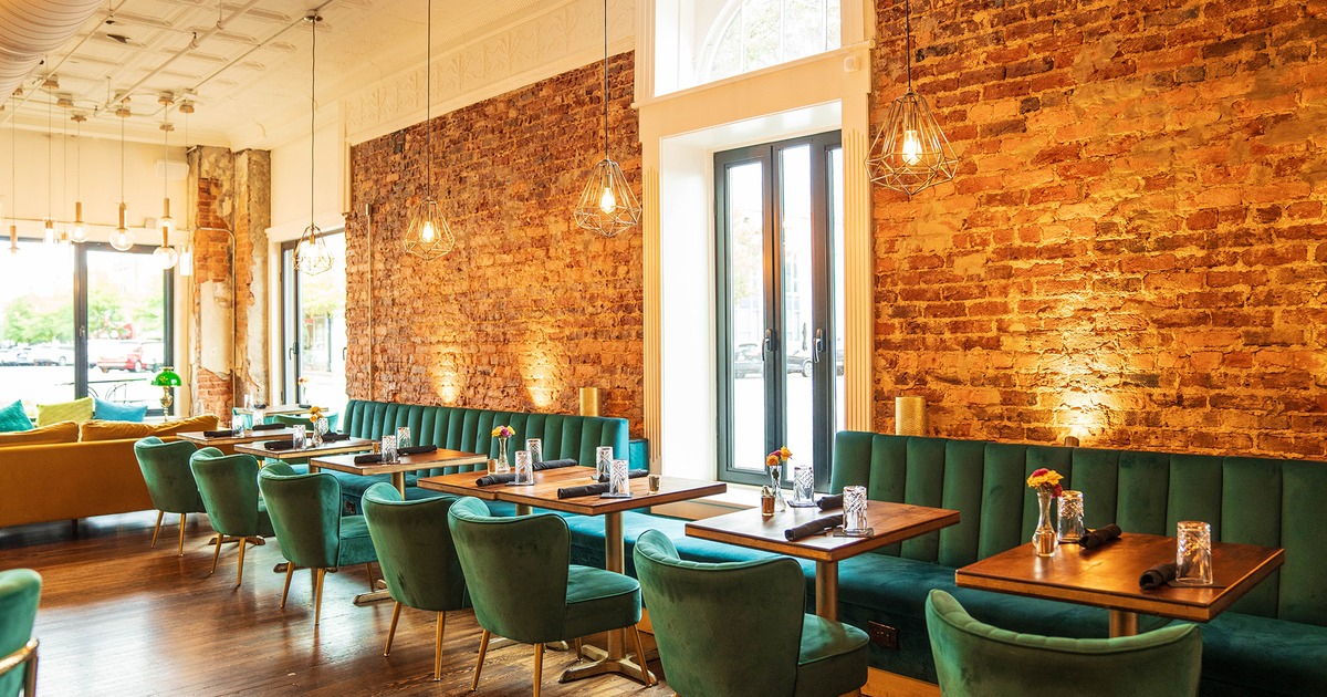 Modern style of dining area interior design with set tables