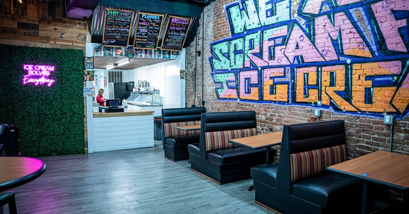 Booth tables, wall graffiti