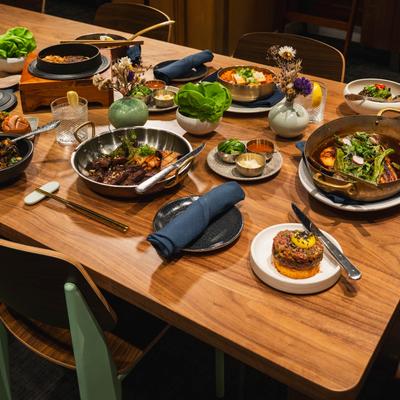 Various food and drinks on the table.