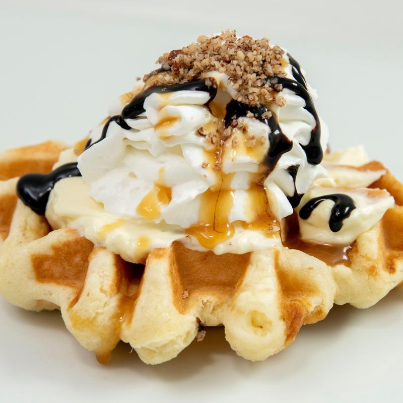 Liège Waffle with Turtle Cheesecake and Whipped Cream photo