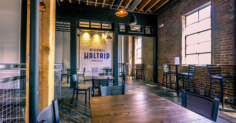 Interior, seating area with low and high tables