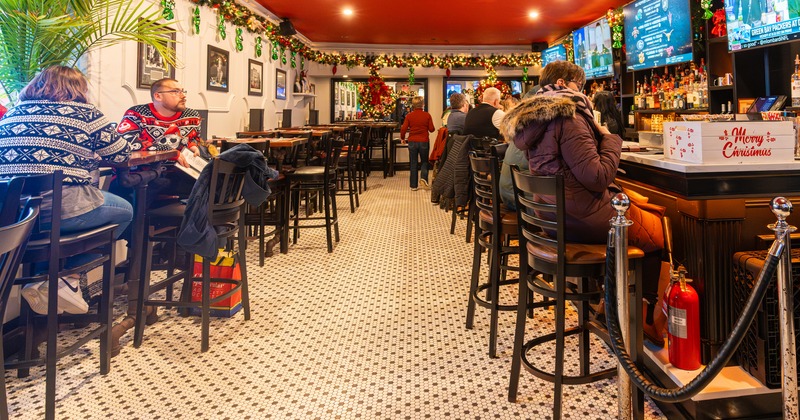 Bar area, bar, chairs, guests