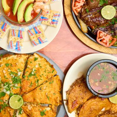 Assorted Mexican dishes on a table.