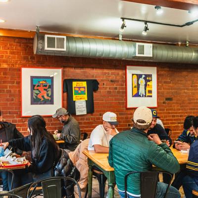 Lots of guests at the restaurant.