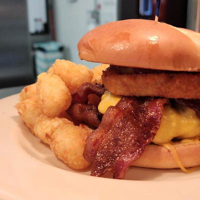 Whiskey Jack burger served with tater tots.