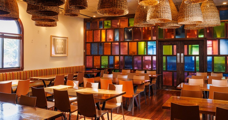 Interior, spacious dining area with tables and chairs