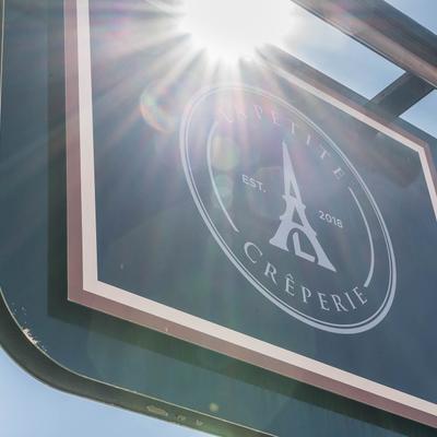 The venue's board sign outside.