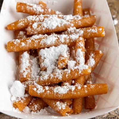 Funnel Fries, topped with powdered sugar.