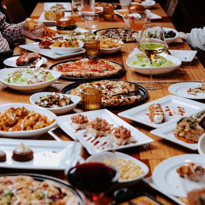 A table filled with served food and drinks.