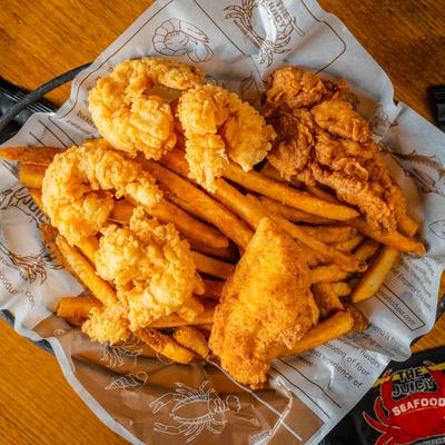 Shrimp and Chicken tender combo with fries.