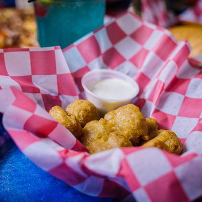 Fried Mushrooms served with a sauce dip.